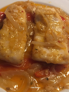 Una foto de Encebollado de Merluza