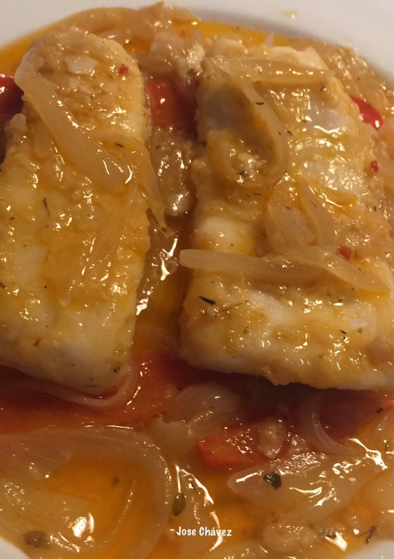 Una foto de Encebollado de Merluza