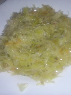 A picture of Fried cabbage with carrots.
