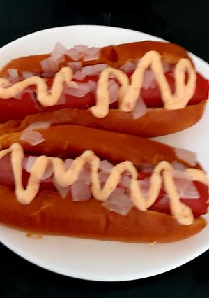 A picture of My Filling Hot Dogs with Onion and Brioche Bun.