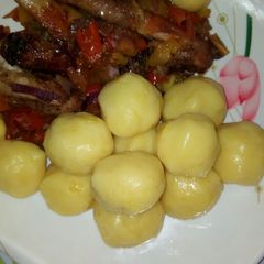 A picture of Marsh potatoes with pepper chicken.