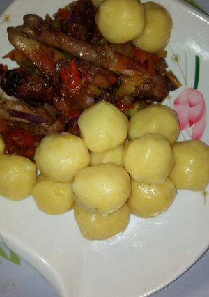 A picture of Marsh potatoes with pepper chicken.