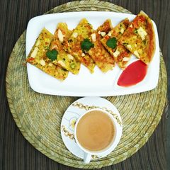 A picture of Cheesy Anda Paratha.