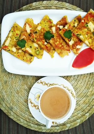 A picture of Cheesy Anda Paratha.
