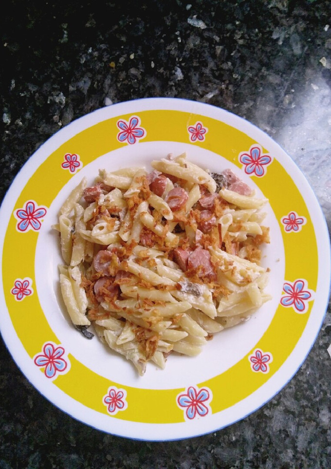 Una foto de Macarrones con champiñones en falsa carbonara