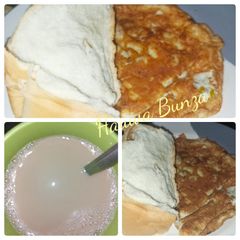 A picture of Cloves tea,spicy omellete and bread.