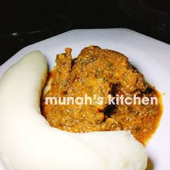 A picture of Pounded yam and egusi soup.