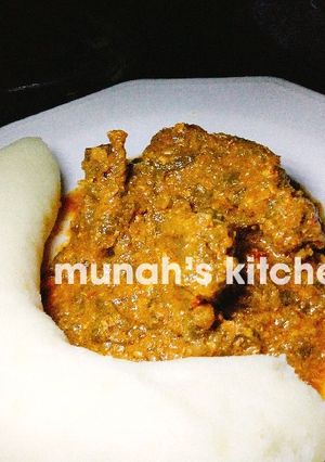 A picture of Pounded yam and egusi soup.