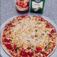 A picture of Tikka pizza(whats up group recipe).