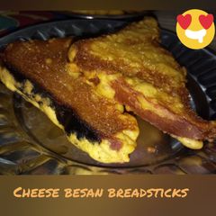 A picture of CHEESY besan bread sticks.
