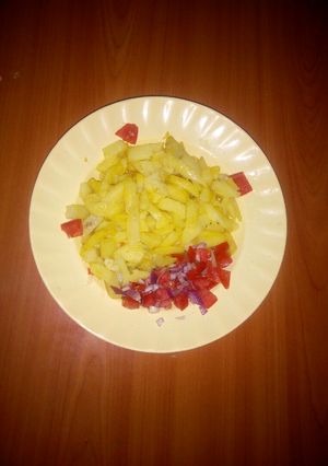 A picture of Homemade Fries & Kachumburi.