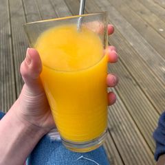 A picture of Mango and orange slushie.