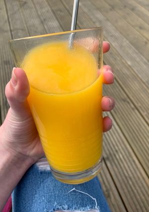 A picture of Mango and orange slushie.