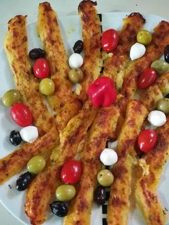 Una foto de Palos de patatas con queso
