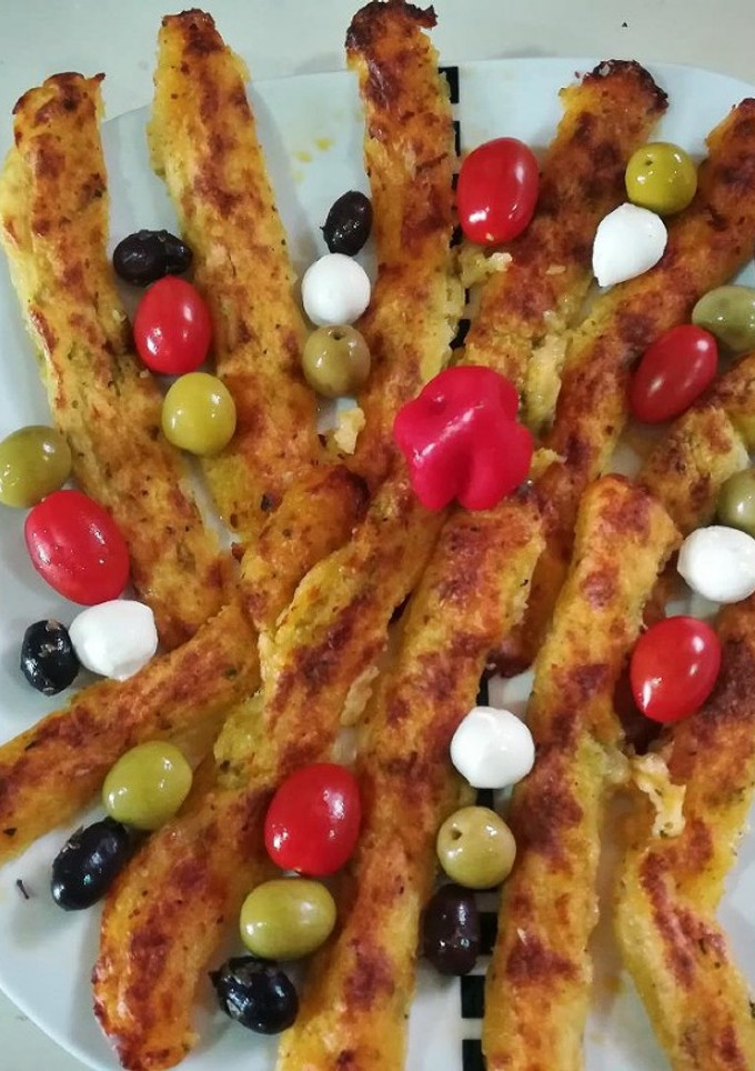 Una foto de Palos de patatas con queso