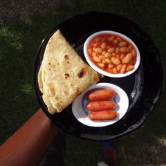 A picture of Mini bites with baked beans.