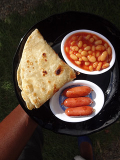 A picture of Mini bites with baked beans.