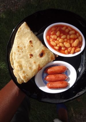 A picture of Mini bites with baked beans.