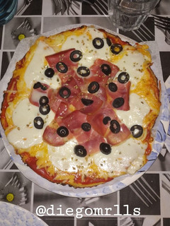 Una foto de Pizza con base de coliflor
