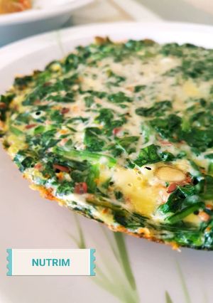 Una foto de Tortilla de espinacas y semillas