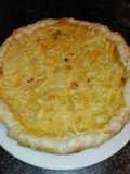 Pastel de bacalao y palitos de cangrejo gratinado con queso
