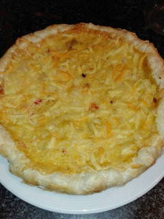 Una foto de Pastel de bacalao y palitos de cangrejo gratinado con queso