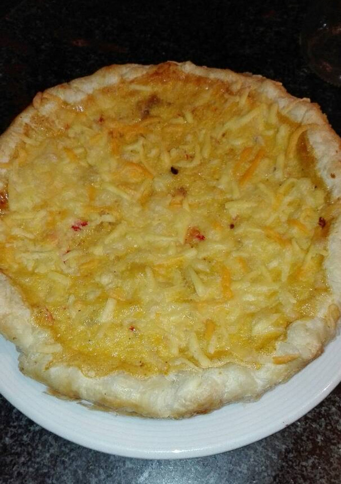Una foto de Pastel de bacalao y palitos de cangrejo gratinado con queso