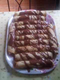 Una foto de Panqueques con dulce de leche y chocolate!!!!!😍😍🤗