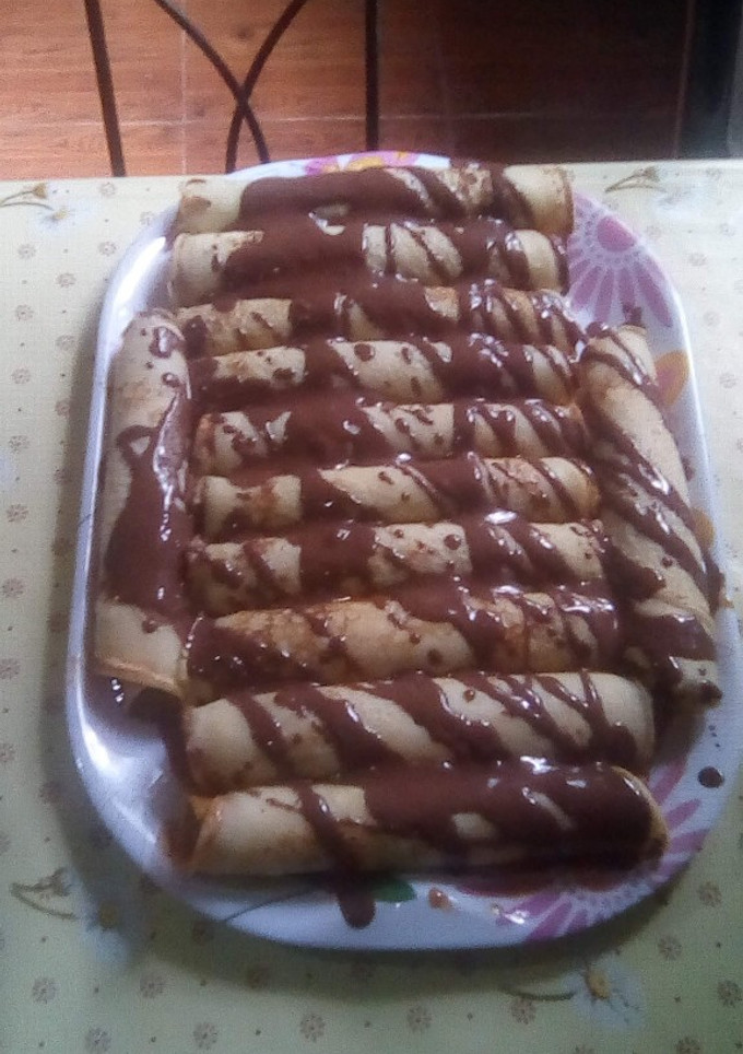 Una foto de Panqueques con dulce de leche y chocolate!!!!!😍😍🤗