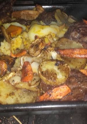 Una foto de Tapa de asado con verduras al horno 