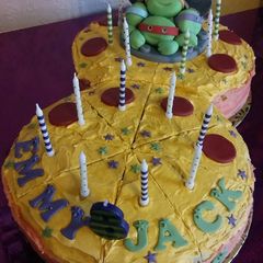 A picture of Vickys Ninja Turtle Pizza / Sewer Cake - Instructional.