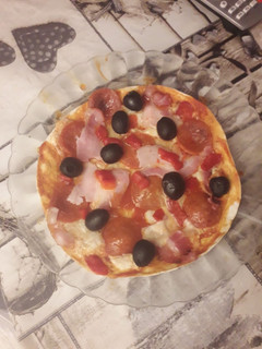 Una foto de Masa de burrito en forma de pizza a mi estilo