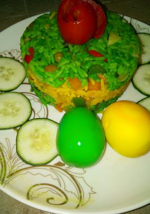 A picture of Potato fried rice and meat fried rice with coloured eggs.