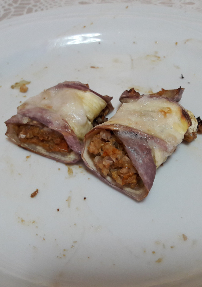Una foto de Canelones de berenjena gratinados bajos en grasa, sin gluten y veganos 🍆