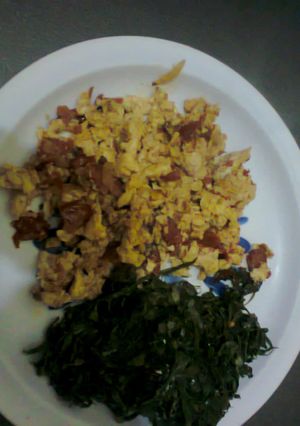 A picture of Fried eggs + Sautéed Kale.