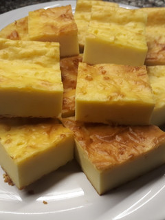 Una foto de Fainá de queso y polenta