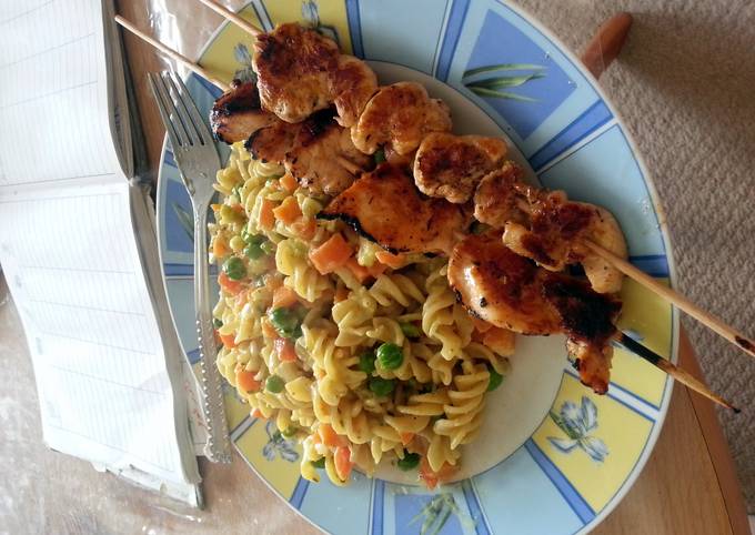 creamy pasta with mixed vegetables and grilled chicken