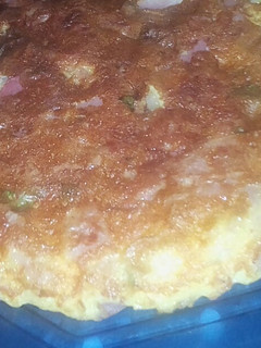 Una foto de Tortilla de pancho, jamón y queso sándwich
