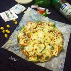 A picture of Tahini sauce in a Chickpea paneer pizza.