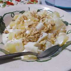 Una foto de Ensalada especial de ananá, nueces y palmitos
