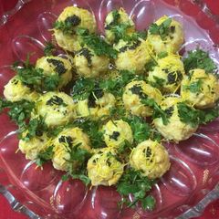 A picture of Stuffed khandvi Balls pressure cooker method.