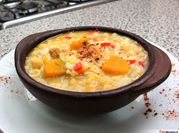 Una foto de garbanzo arroz zapallo