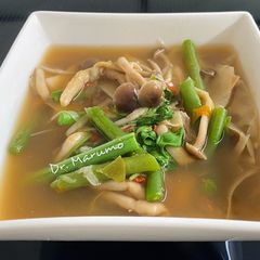 Spicy Bamboo Shoot with Fresh Brown Shimeji Mushroom A picture of Spicy Bamboo Shoot with Fresh Brown Shimeji Mushroom.