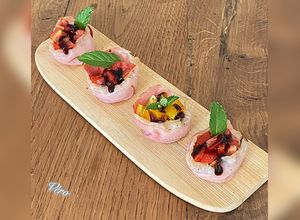 Une photo de Panier de jambon Serrano aux tomates