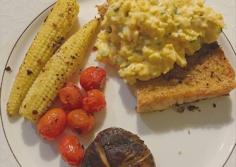 Breakfast of the day: scrambled eggs over toast Breakfast of the day: scrambled eggs over toast