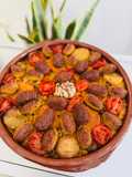 Arroz al horno de Pascua. Con albóndigas de bacalao, garbanzos, castañas y pasas