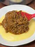 Carne de vaca desfiada estufada com puré