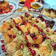 Pomegranate Pistachios Rabri Kunafa Rolls A picture of Pomegranate Pistachios Rabri Kunafa Rolls.