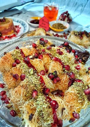 A picture of Pomegranate Pistachios Rabri Kunafa Rolls.