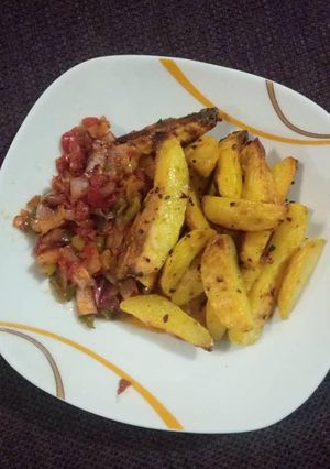 A picture of Oven Roast Potatoes with pepper sauce.
